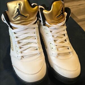 Jordan Gold Tongue Basketball Sneakers in White and Black